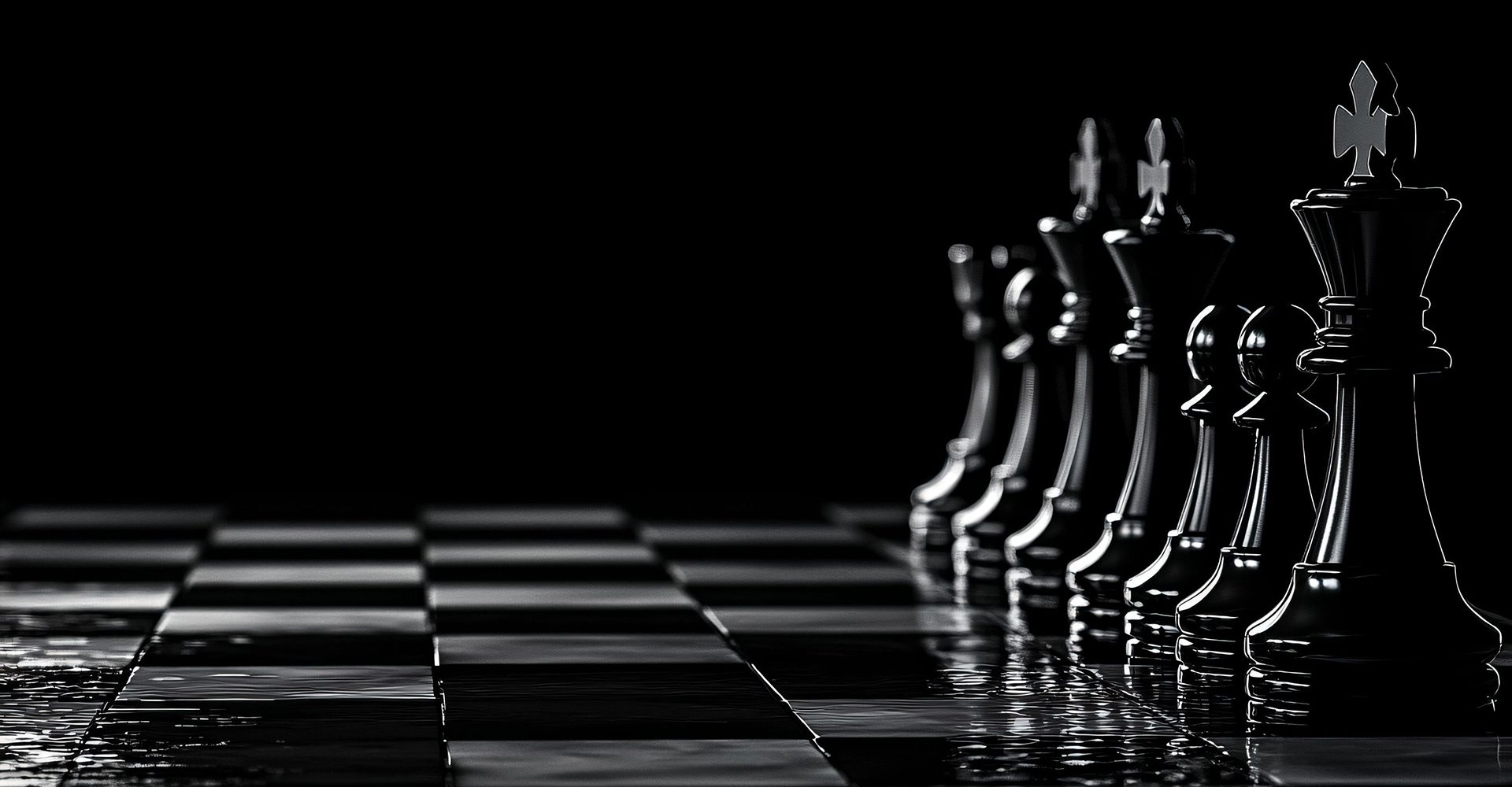 Black chess pieces lined up on a glossy chessboard in dramatic lighting